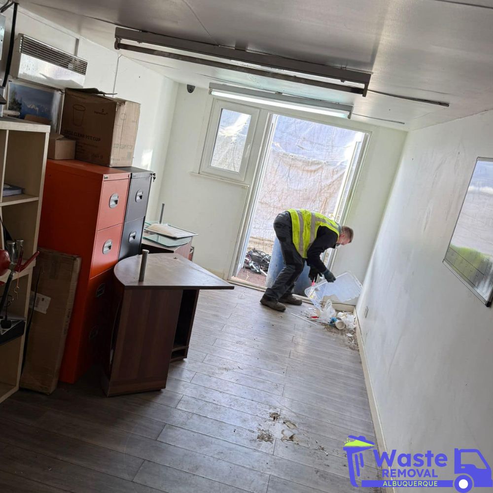 Our team member collecting trash inside home